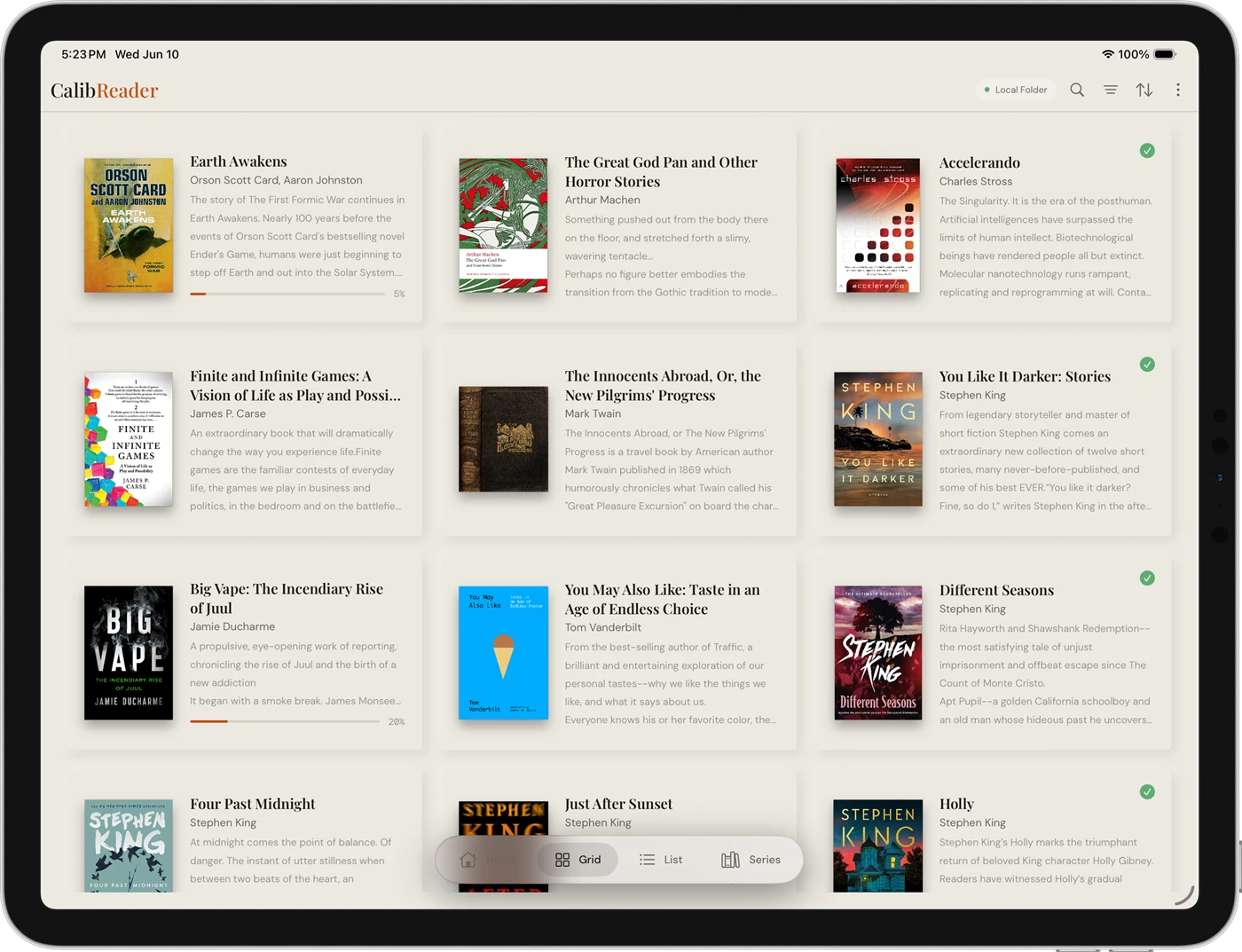 CalibReader's grid library view on an iPad
